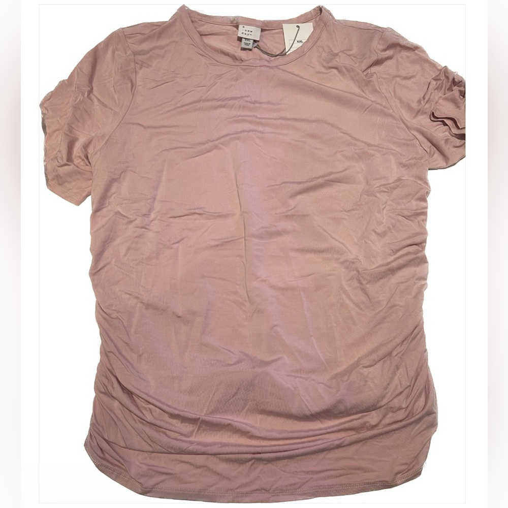 Casual light pink, short sleeved top with ruching / ruffling on sides. Size XXL